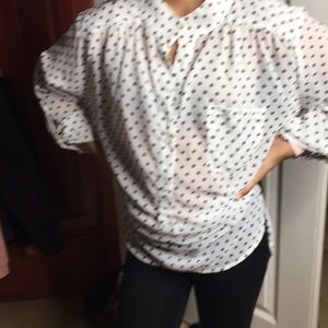 White and polka dot blouse